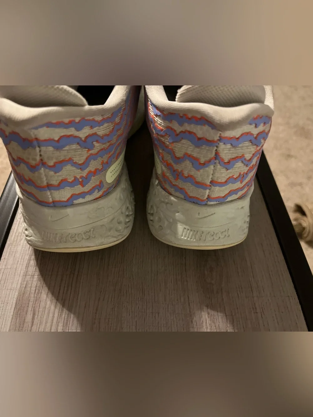 Nike Women's KD Sneakers with Orange Swoosh and Blue Accents